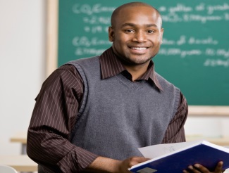 teacher in front of blackboard